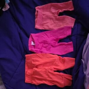 3 Newborn Orange, Bright Pink, and Coral Cotton Pants Set